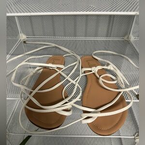 White flat lace up sandals